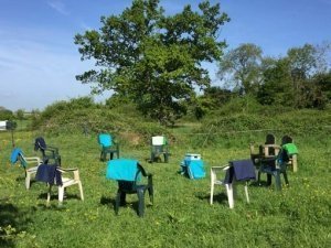 Chairs and blankets mark out the outdoor space for a workshop which combines presence, mindfulness and time in nature near Bristol UK
