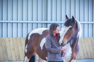 woman and horse looking into each others eyes near bath uk