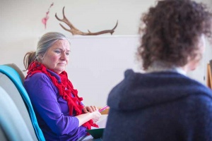 student in contemplation during a group coaching session